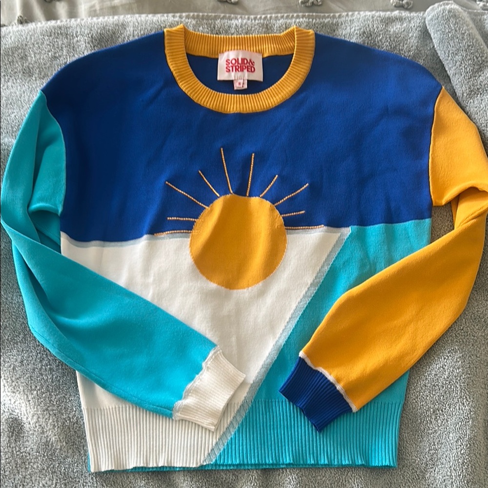 NWOT solid and striped sweater size small